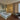 Elegantly appointed bedroom furnished with high-quality furniture and furnishings, offering a blend of style and comfort.